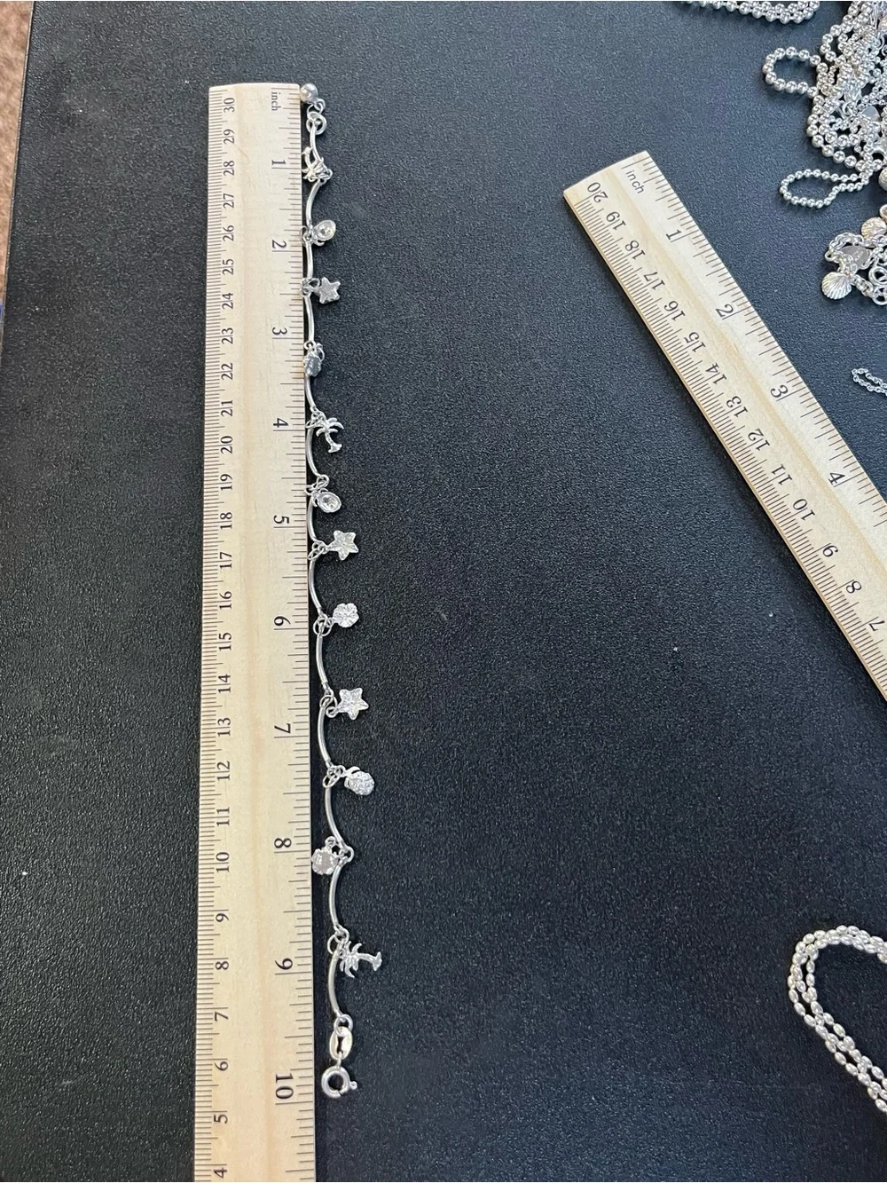 Sterling silver tropical theme anklet. 10”. Starfish, palm trees, pineapple.6.5g